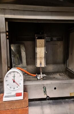 EN ISO 11925 آزمایش قابل احتراق مواد ساختمانی - آزمایش یک منبع آتش